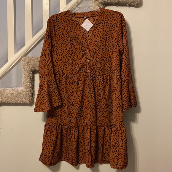 Dresses & Skirts - Boutique:Cheetah print brown with black spots, Bell sleeve dress never worn